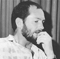 Black and white photo of Kenny Everett